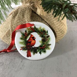 Red Male Cardinal Perched on Wreath Ceramic Christmas Ornament  2.75 Inch